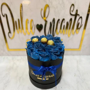 Cilindro con rosas azules y chocolates Ferrero Rocher