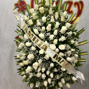 Corona funebre en rosas