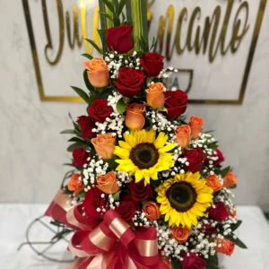 Arreglo floral con rosas y girasoles
